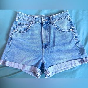 Light blue high waisted Jean shorts, size 2, the brand is divided